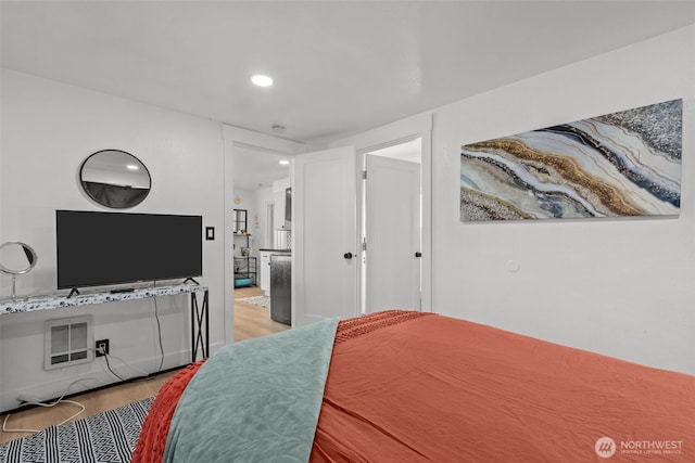 1027 E 47th St, Tacoma, WA 98404 - bedroom featuring light wood-style floors and recessed lighting