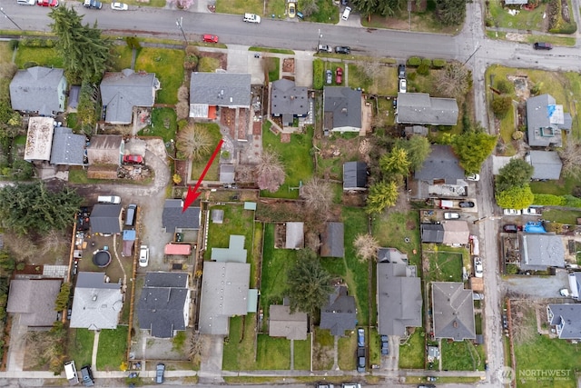 1027 E 47th St, Tacoma, WA 98404 - aerial view of property and surrounding area featuring nearby suburban area