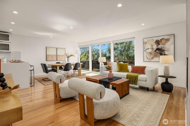 2434 64th Ave SE, Mercer Island, WA 98040 - living room featuring recessed lighting and light wood-style flooring