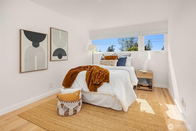 2434 64th Ave SE, Mercer Island, WA 98040 - bedroom featuring wood finished floors and baseboards