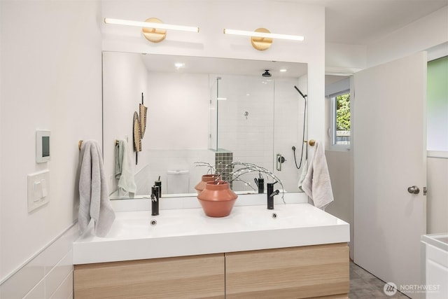 2434 64th Ave SE, Mercer Island, WA 98040 - bathroom featuring double vanity and a tile shower