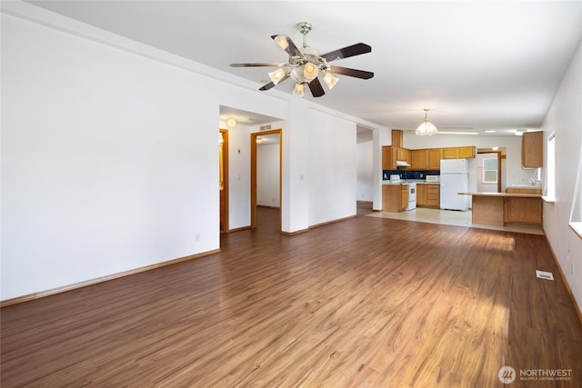 101 Twin Lakes Rd, Cle Elum, WA 98922 - unfurnished living room with wood finished floors and ceiling fan