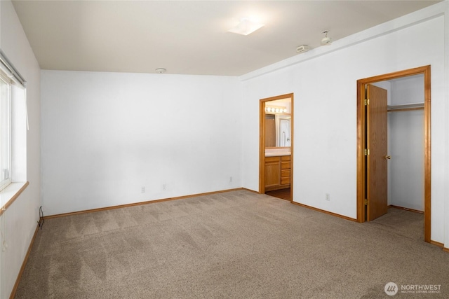 101 Twin Lakes Rd, Cle Elum, WA 98922 - unfurnished bedroom with carpet, a walk in closet, and ensuite bathroom