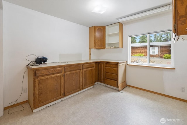101 Twin Lakes Rd, Cle Elum, WA 98922 - kitchen with light countertops, light flooring, brown cabinets, and open shelves