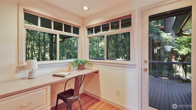 9411 SE 54th St, Mercer Island, WA 98040 - doorway to outside with light wood-type flooring, built in desk, and recessed lighting