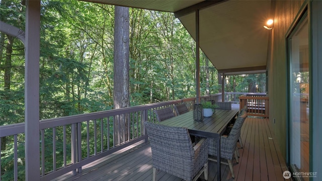 9411 SE 54th St, Mercer Island, WA 98040 - deck with outdoor dining space and a view of trees