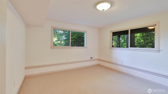 9411 SE 54th St, Mercer Island, WA 98040 - carpeted spare room with plenty of natural light
