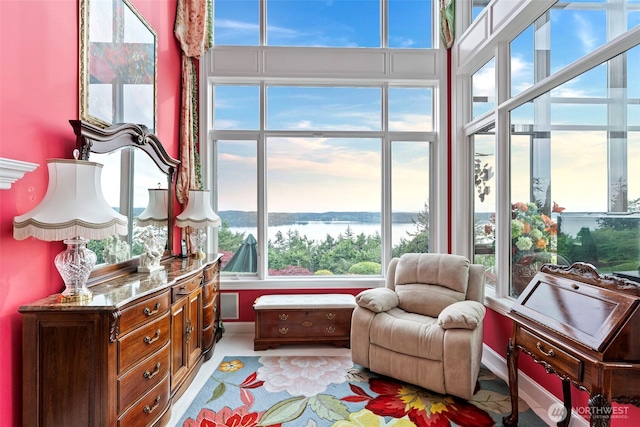 1022 7th Ct, Fox Island, WA 98333 - sitting room featuring a water view and baseboards
