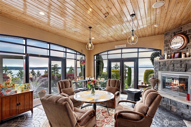1022 7th Ct, Fox Island, WA 98333 - sunroom / solarium with a water view
