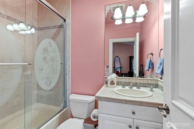 1022 7th Ct, Fox Island, WA 98333 - bathroom with vanity and shower / bath combination with glass door