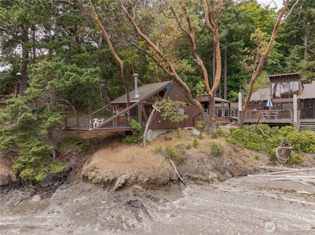 69 Rocky Rd, Crane Island, WA 98245 - view of yard with a wooden deck and stairs