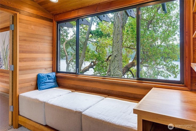 69 Rocky Rd, Crane Island, WA 98245 - sitting room with wood walls, vaulted ceiling, and wooden ceiling