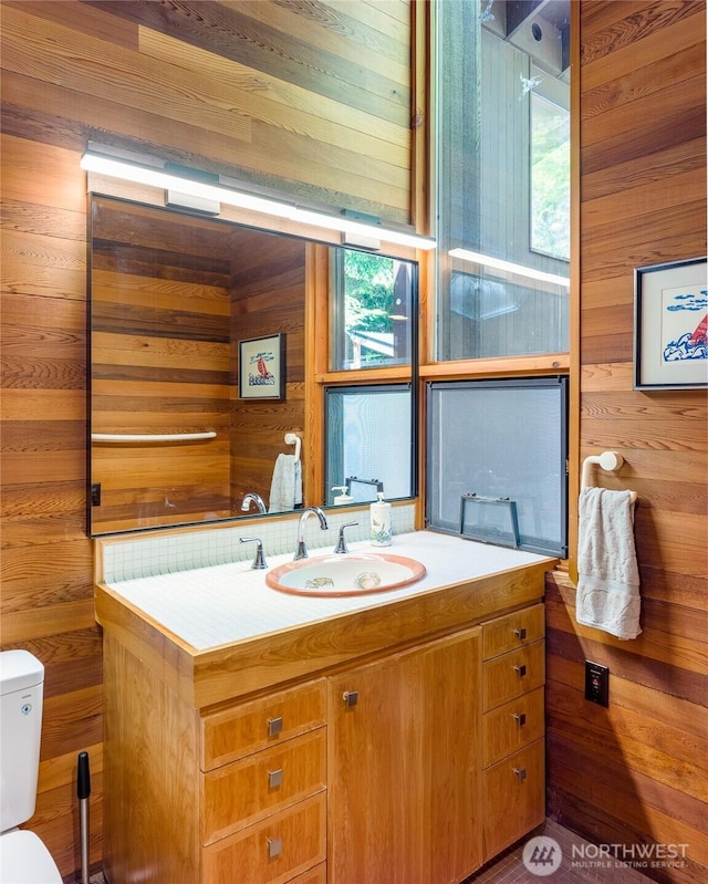 69 Rocky Rd, Crane Island, WA 98245 - half bath with wooden walls and vanity
