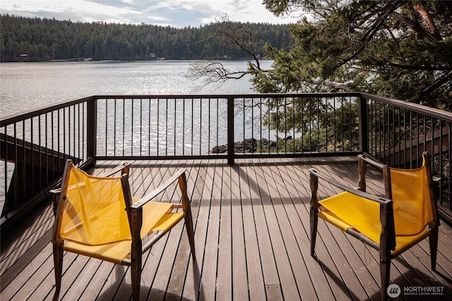 69 Rocky Rd, Crane Island, WA 98245 - deck featuring a view of trees and a water view