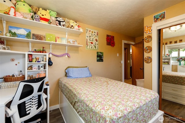 1130 Central Dr, Coulee Dam, WA 99116 - bedroom with dark wood-style flooring