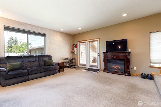 1130 Central Dr, Coulee Dam, WA 99116 - carpeted living area with healthy amount of natural light, a glass covered fireplace, and recessed lighting