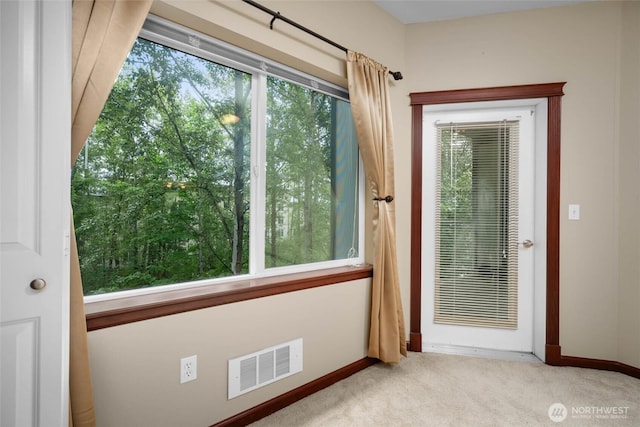 259 W Bakerview Unit 304, Bellingham, WA 98226 - doorway to outside with carpet and baseboards