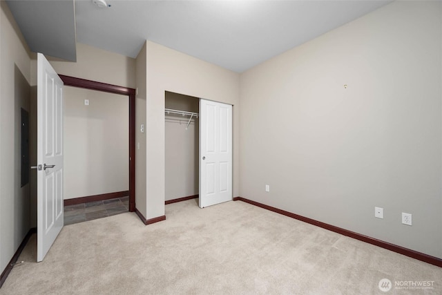 259 W Bakerview Unit 304, Bellingham, WA 98226 - unfurnished bedroom with light colored carpet and a closet