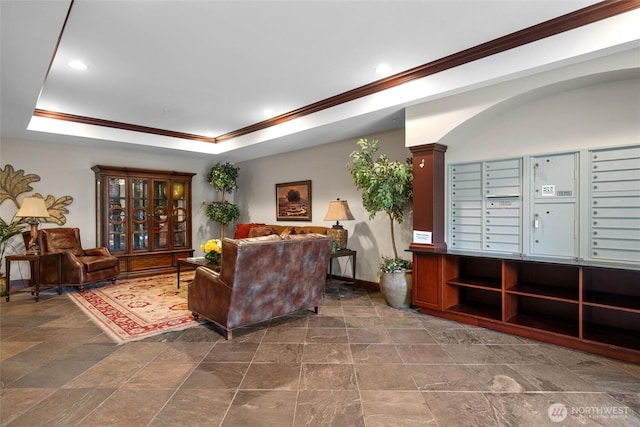 259 W Bakerview Unit 304, Bellingham, WA 98226 - living area featuring ornamental molding, stone finish flooring, mail area, a raised ceiling, and recessed lighting
