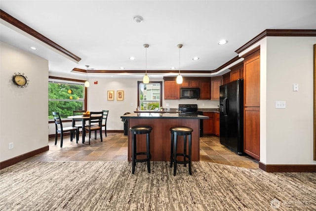 259 W Bakerview Unit 304, Bellingham, WA 98226 - kitchen with black appliances, ornamental molding, a breakfast bar area, recessed lighting, and a kitchen island