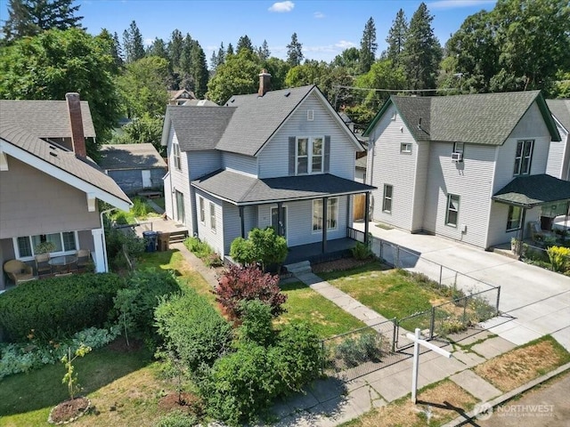 524 E 9th Ave, Spokane, WA 99202 - view of front facade with a shingled roof, a porch, driveway, and a residential view