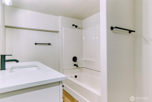 4957 Lewis Ave, Bellingham, WA 98229 - full bathroom featuring bathtub / shower combination, vanity, and wood finished floors