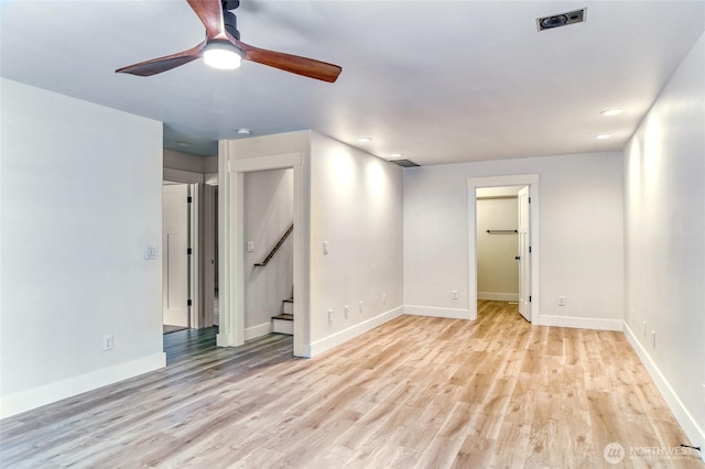 4957 Lewis Ave, Bellingham, WA 98229 - empty room featuring light wood-style flooring, ceiling fan, and stairs