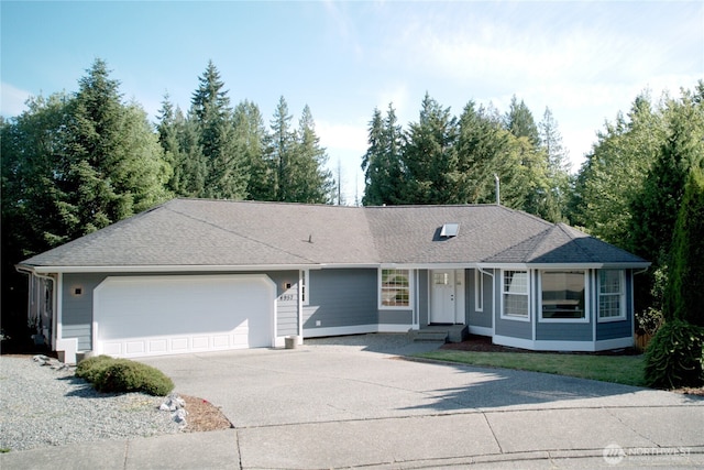 4957 Lewis Ave, Bellingham, WA 98229 - ranch-style home with an attached garage, driveway, and a shingled roof