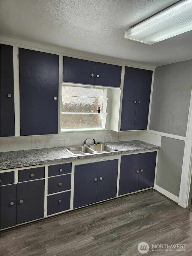3023 Aberdeen Ave, Hoquiam, WA 98550 - kitchen with dark wood-type flooring, a textured ceiling, and blue cabinetry
