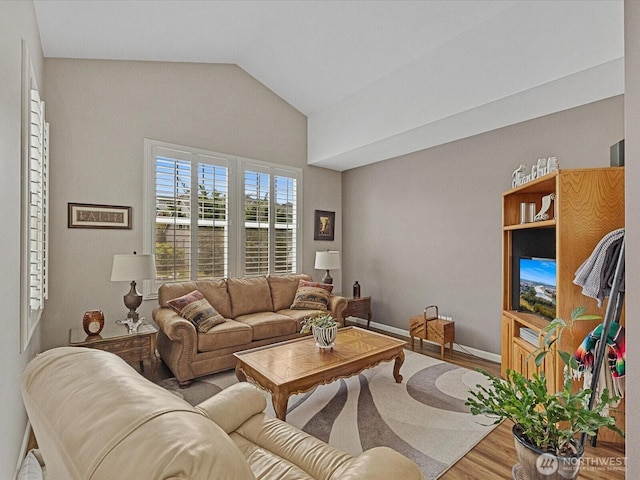 12732 69th Dr SE, Snohomish, WA 98296 - living room featuring wood finished floors and lofted ceiling