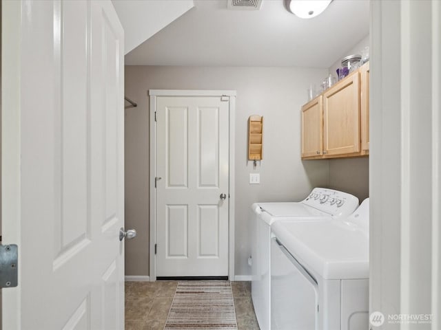 12732 69th Dr SE, Snohomish, WA 98296 - laundry area featuring separate washer and dryer, cabinet space, and tile patterned flooring