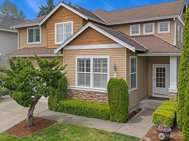 12732 69th Dr SE, Snohomish, WA 98296 - craftsman house featuring a shingled roof and stone siding