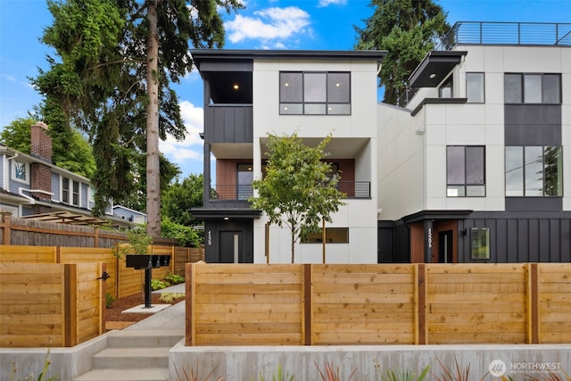 4529 S Orcas St, Seattle, WA 98118 - modern home with stucco siding and board and batten siding