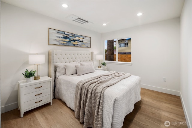4529 S Orcas St, Seattle, WA 98118 - bedroom with light wood-style floors and recessed lighting