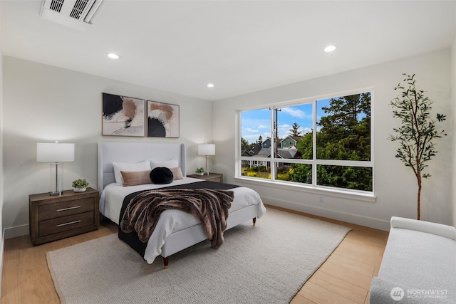 4529 S Orcas St, Seattle, WA 98118 - bedroom featuring light wood-style flooring and recessed lighting