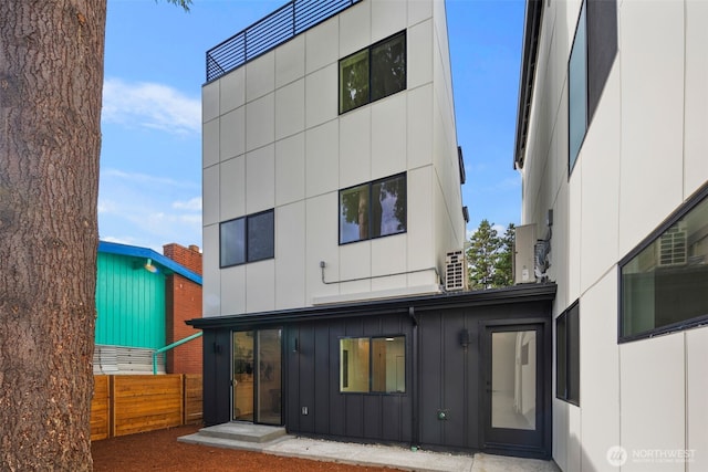 4529 S Orcas St Unit B, Seattle, WA 98118 - rear view of house featuring board and batten siding