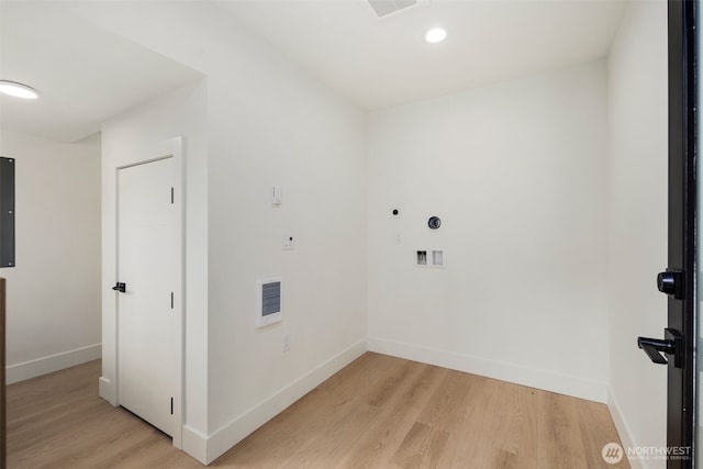 4529 S Orcas St Unit B, Seattle, WA 98118 - laundry room featuring light wood-style flooring and recessed lighting