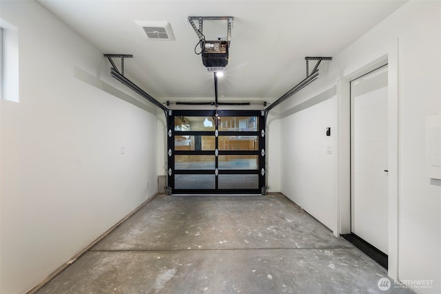 4525 S Orcas St, Seattle, WA 98118 - garage featuring a garage door opener