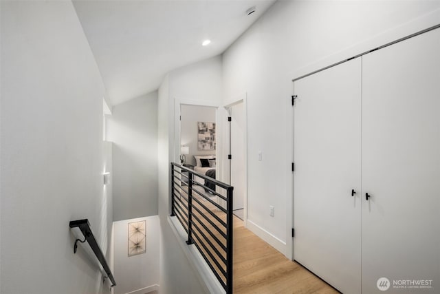 4525 S Orcas St, Seattle, WA 98118 - stairway featuring lofted ceiling, wood finished floors, and recessed lighting
