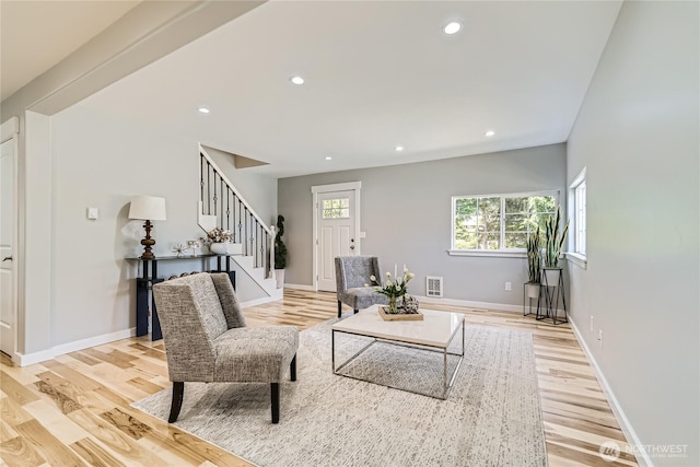625 SW 122nd St, Seattle, WA 98146 - living room featuring stairs, light wood finished floors, and recessed lighting
