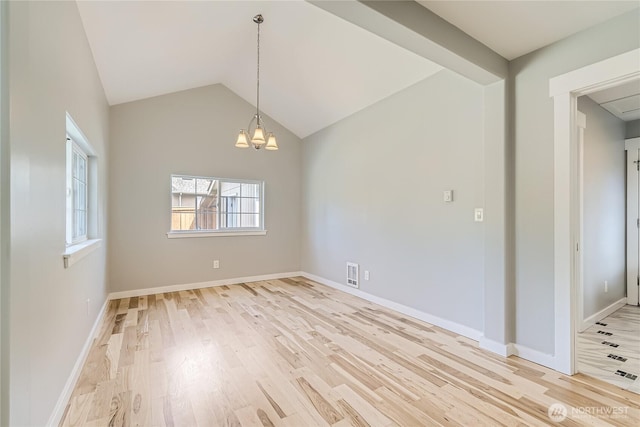625 SW 122nd St, Seattle, WA 98146 - unfurnished room featuring light wood-type flooring, a chandelier, and vaulted ceiling
