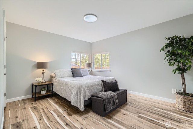 625 SW 122nd St, Seattle, WA 98146 - bedroom with light wood finished floors and baseboards