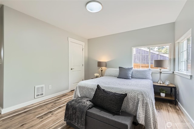 625 SW 122nd St, Seattle, WA 98146 - bedroom featuring baseboards and wood finished floors