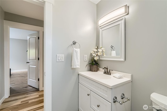 625 SW 122nd St, Seattle, WA 98146 - half bath with vanity and wood finished floors