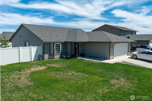 925 S 11th Ave, Othello, WA 99344 - view of front of house with driveway, a garage, and roof with shingles