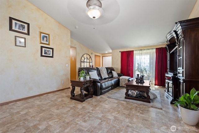 925 S 11th Ave, Othello, WA 99344 - living area featuring ceiling fan, lofted ceiling, and stone finish floors