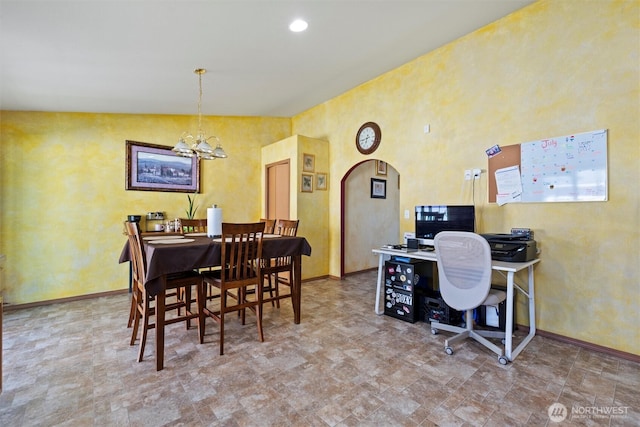 925 S 11th Ave, Othello, WA 99344 - dining area featuring a chandelier and arched walkways