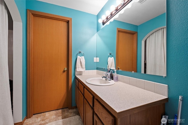 925 S 11th Ave, Othello, WA 99344 - bathroom with vanity and stone finish floors