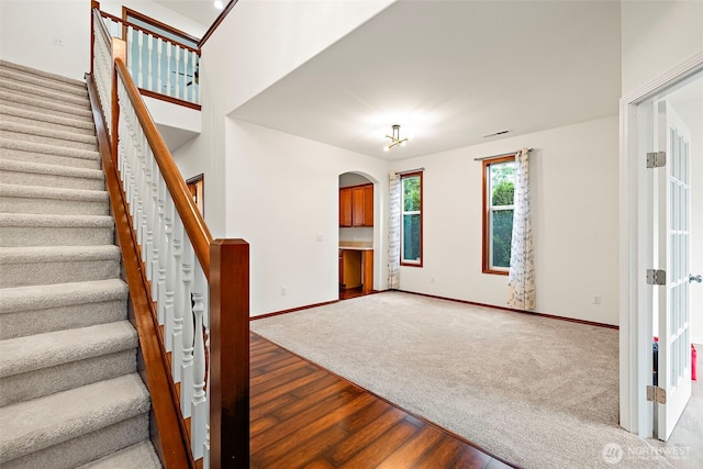 22820 41st Dr SE, Bothell, WA 98021 - stairway featuring wood finished floors and arched walkways