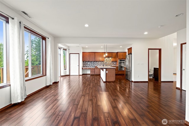 22820 41st Dr SE, Bothell, WA 98021 - unfurnished living room featuring dark wood finished floors and recessed lighting
